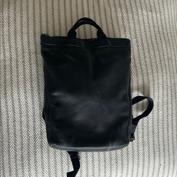 black leather backpack handbag Small - Voyager #7835 Burberry Check and Leather Model:TSAWESS-802 LT Pretty meets practicality in Locking Straps